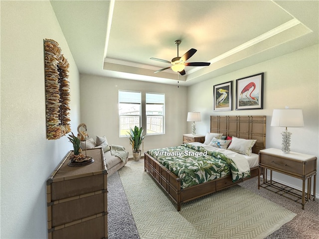 1030 Ocean Breeze St, Portland, TX 78374 - carpeted bedroom featuring a tray ceiling and ceiling fan