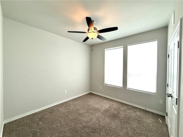 1030 Ocean Breeze St, Portland, TX 78374 - unfurnished room with dark carpet and ceiling fan