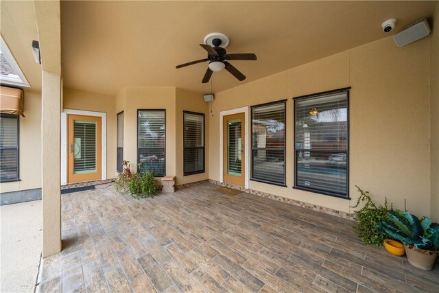 view of patio with ceiling fan