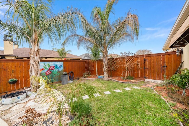 view of yard featuring a fenced backyard