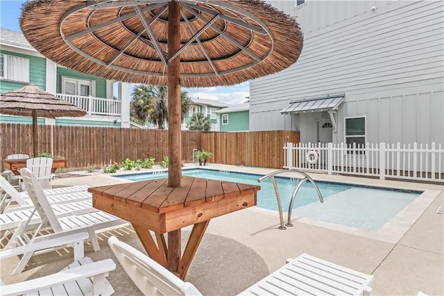 view of pool featuring a patio