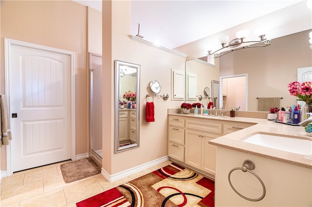 bathroom featuring vanity and a shower with door