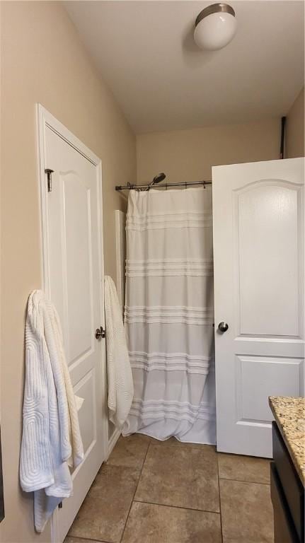 bathroom with vanity and tile patterned floors