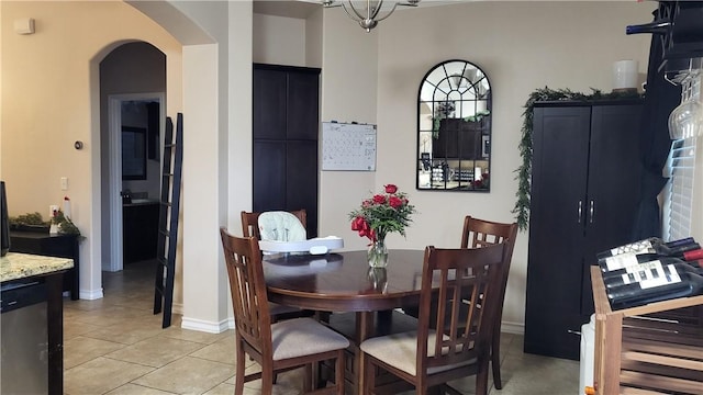 dining area featuring light tile patterned flooring