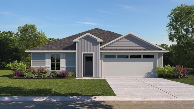 view of front of home featuring a front yard and a garage