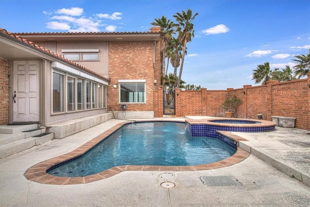 view of swimming pool with a gate, a patio, a fenced backyard, a fenced in pool, and an in ground hot tub