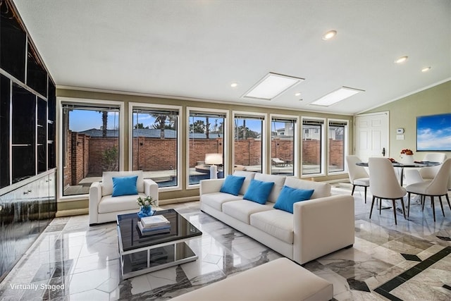 sunroom with lofted ceiling with skylight