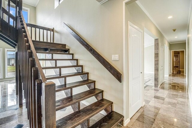 stairs with recessed lighting, baseboards, marble finish floor, and crown molding