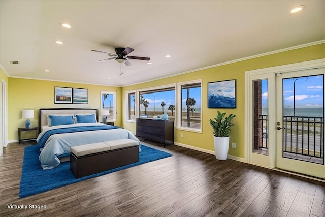 bedroom with baseboards, wood finished floors, access to exterior, and crown molding