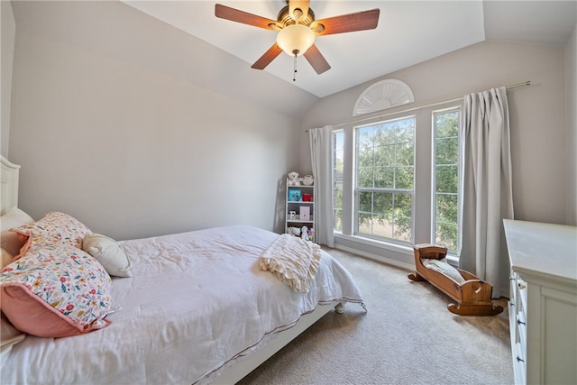 carpeted bedroom with lofted ceiling and ceiling fan