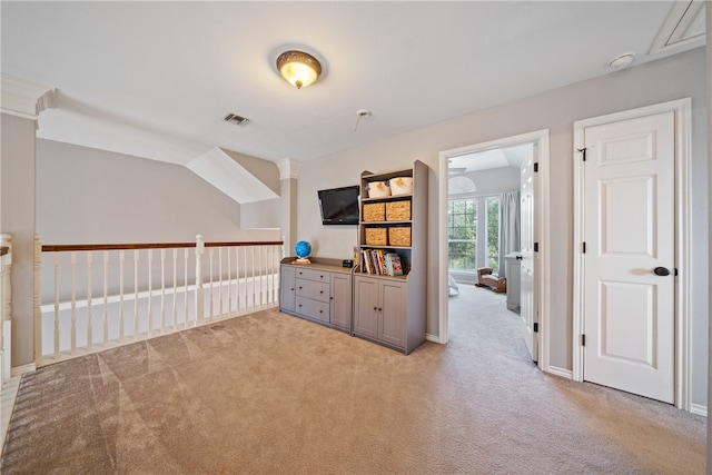 interior space featuring light carpet