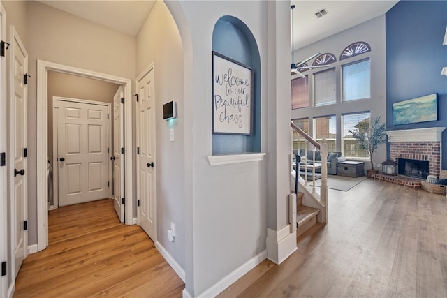 hall with light hardwood / wood-style flooring