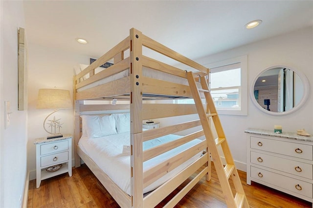 bedroom with wood-type flooring