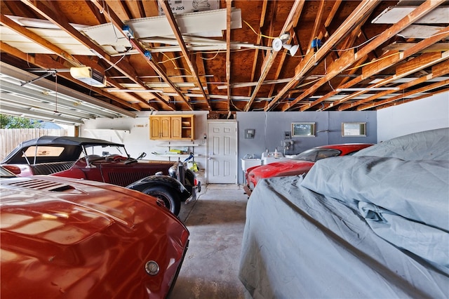 garage featuring a garage door opener