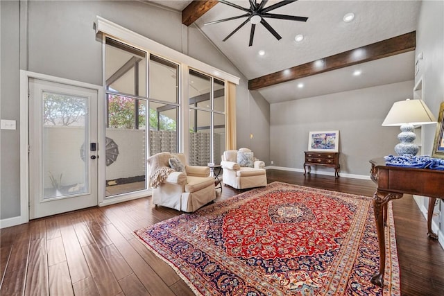 living area featuring vaulted ceiling with beams, ceiling fan, hardwood / wood-style floors, and french doors