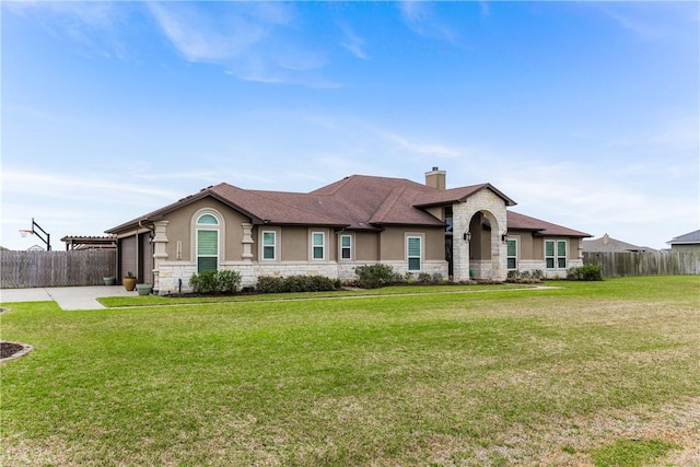 view of front of home with stone siding, fence, and stucco siding