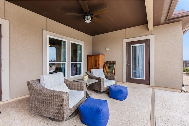 view of patio with ceiling fan