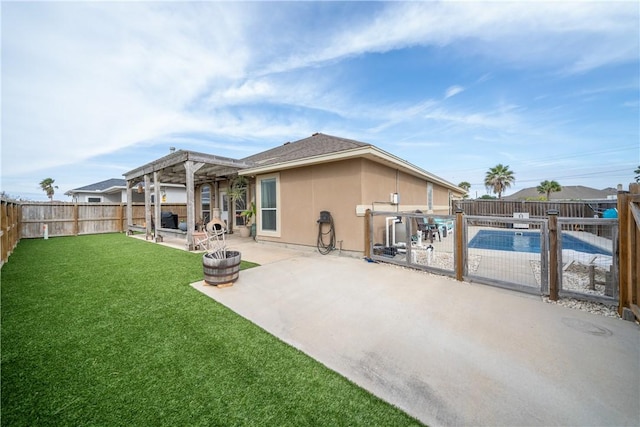 rear view of property with a fenced in pool, a yard, a patio area, and a pergola