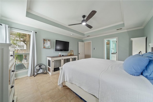 bedroom featuring a raised ceiling, ornamental molding, light tile patterned floors, and ceiling fan