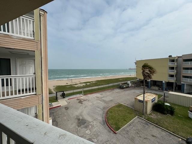 view of water feature with a beach view