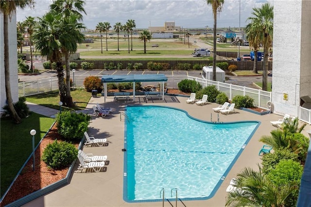 view of swimming pool featuring a patio