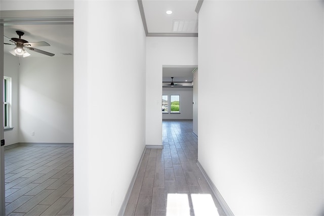 3629 Rebecca Dr, Corpus Christi, TX 78410 - hallway featuring light wood-type flooring and crown molding