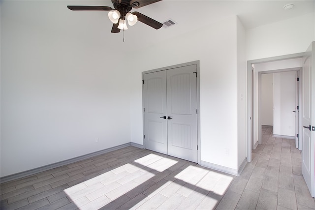 3629 Rebecca Dr, Corpus Christi, TX 78410 - unfurnished bedroom with light wood-type flooring, a closet, and ceiling fan