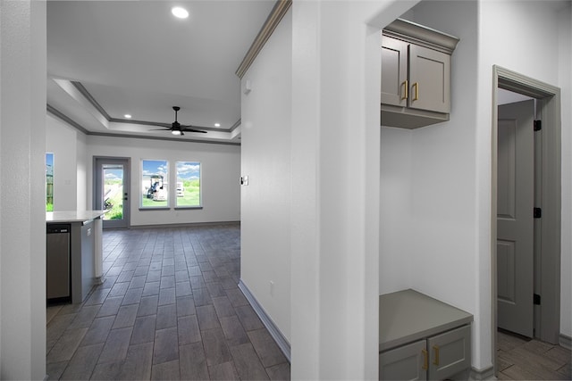 3629 Rebecca Dr, Corpus Christi, TX 78410 - hall with recessed lighting, dark wood-style floors, a tray ceiling, and crown molding