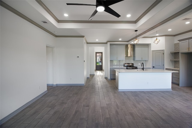 3629 Rebecca Dr, Corpus Christi, TX 78410 - kitchen with gray cabinets, crown molding, light countertops, dark wood-type flooring, and a ceiling fan