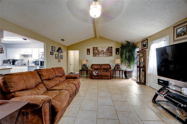 living area with visible vents, lofted ceiling with beams, a textured ceiling, and light tile patterned floors