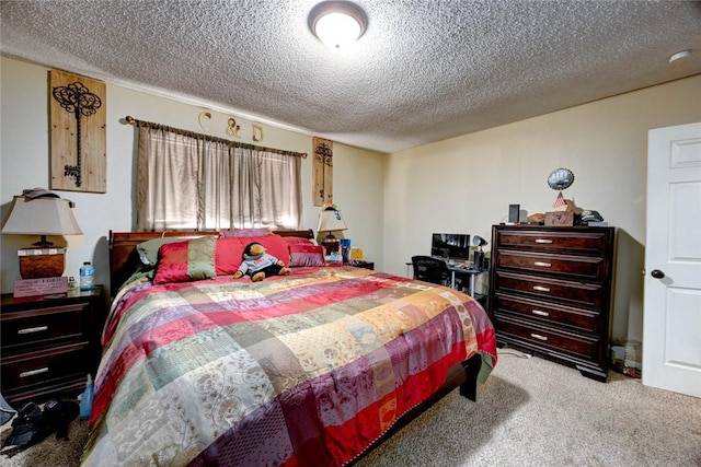 carpeted bedroom with a textured ceiling