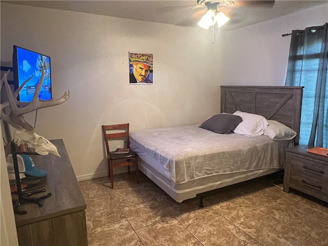 bedroom featuring ceiling fan