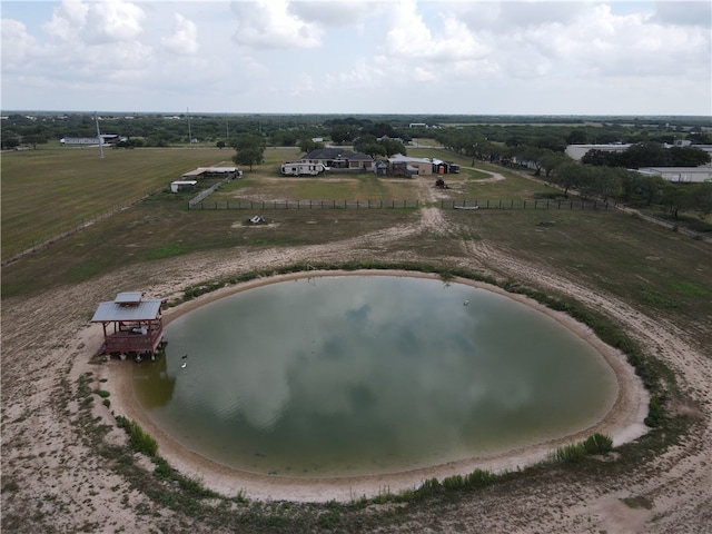 aerial view with a rural view and a water view