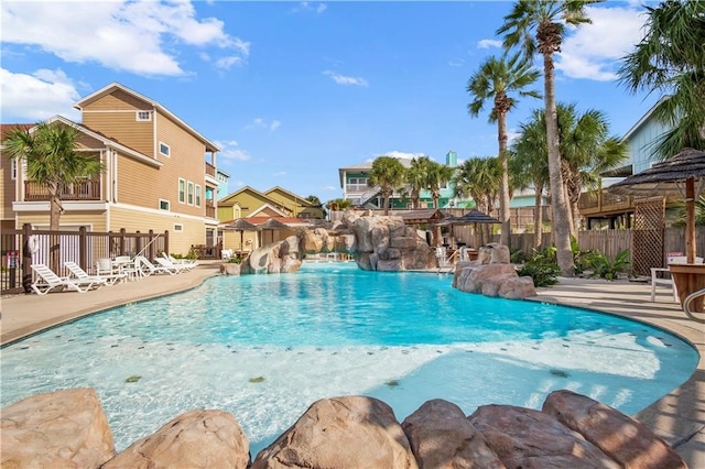 view of swimming pool with a patio area