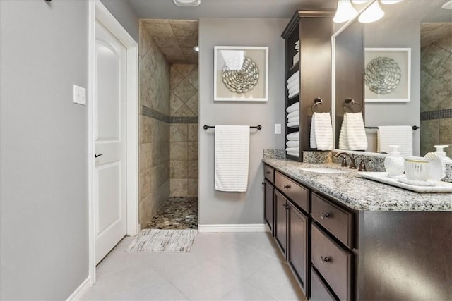 15825 Cozumel Dr, Corpus Christi, TX 78418 - bathroom with vanity, a walk in shower, and tile patterned floors