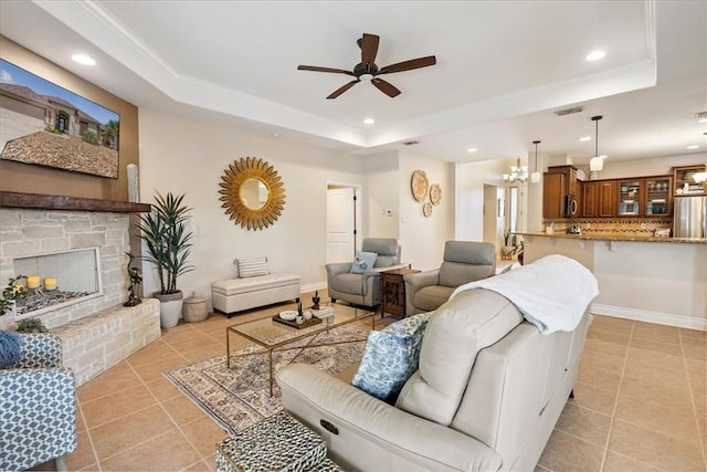 15825 Cozumel Dr, Corpus Christi, TX 78418 - living room with a tray ceiling, light tile patterned floors, a ceiling fan, and recessed lighting