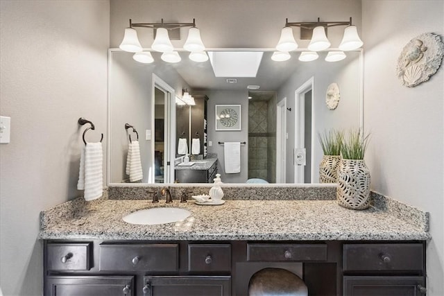 15825 Cozumel Dr, Corpus Christi, TX 78418 - full bathroom featuring vanity and a tile shower