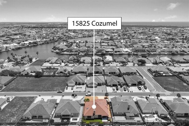 15825 Cozumel Dr, Corpus Christi, TX 78418 - aerial view of residential area featuring a large body of water