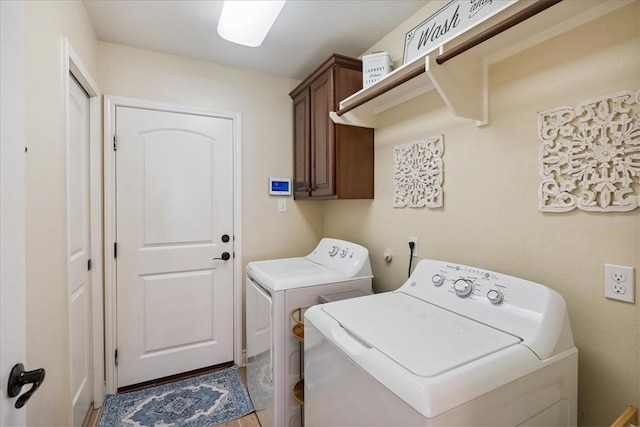 15825 Cozumel Dr, Corpus Christi, TX 78418 - laundry room featuring washer and dryer and cabinet space