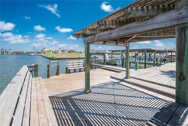 view of dock with a water view