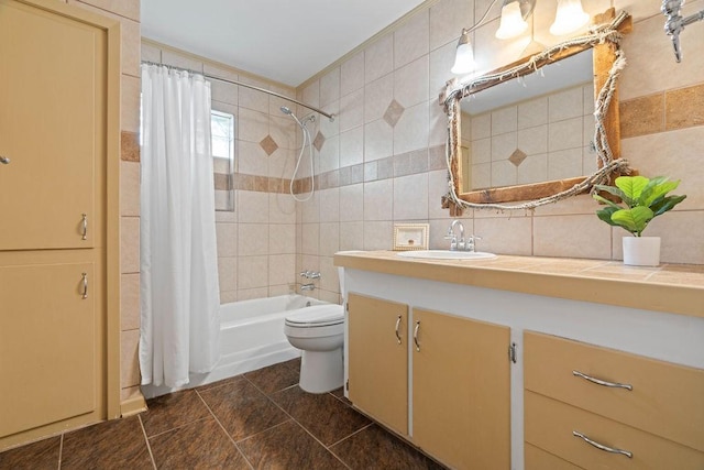 full bath featuring tile walls, toilet, shower / tub combo with curtain, vanity, and backsplash