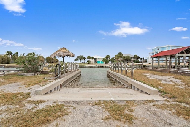 surrounding community with a water view