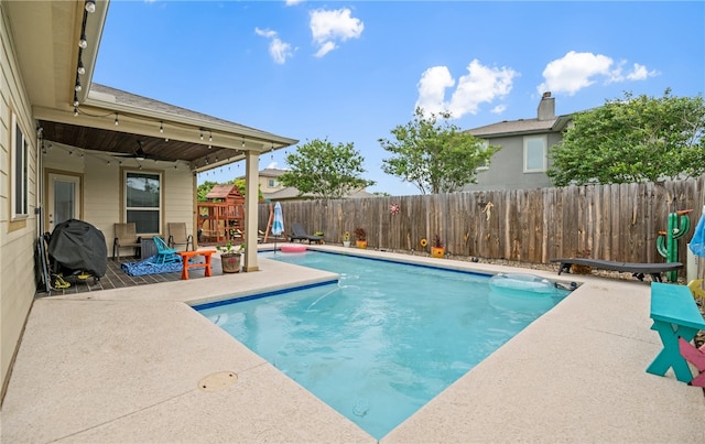 7622 Neches Dr, Corpus Christi, TX 78414 - view of swimming pool featuring a fenced backyard, a patio, and grilling area
