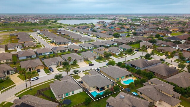 7622 Neches Dr, Corpus Christi, TX 78414 - view of property location featuring a large body of water, a pool, and nearby suburban area