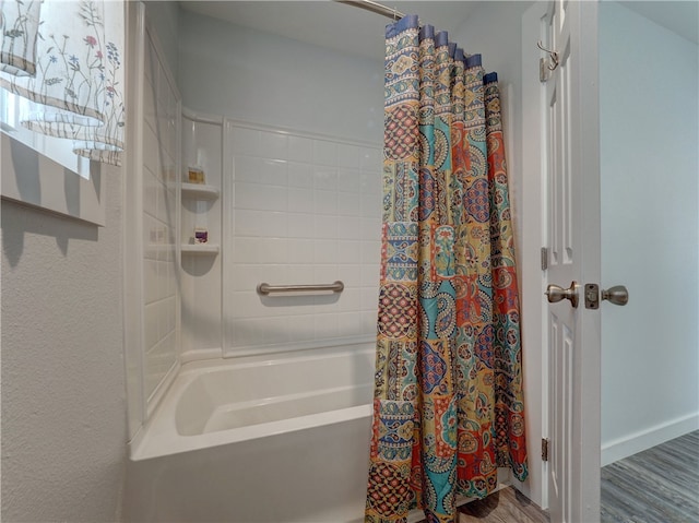 bathroom featuring shower / bath combination with curtain and wood-type flooring