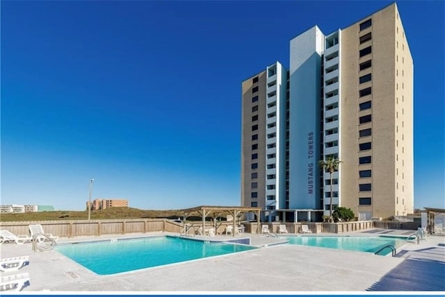 view of swimming pool featuring a patio