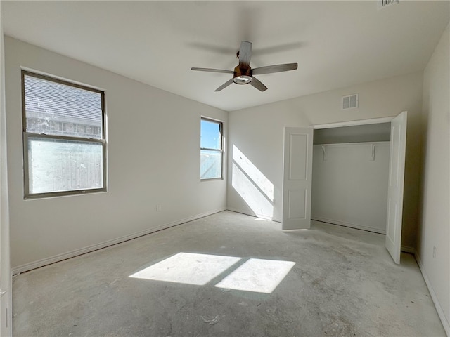 unfurnished bedroom with a closet and ceiling fan