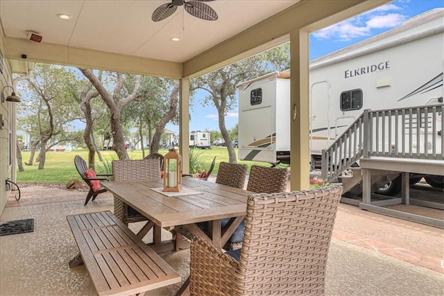 77 Augusta Cir, Aransas Pass, TX 78336 - view of patio with outdoor dining area and ceiling fan