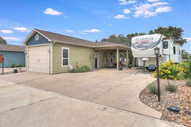 view of front of home with a garage