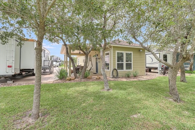 77 Augusta Cir, Aransas Pass, TX 78336 - view of front of home with a front yard